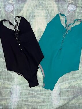 BUY1 GET1 50% OFF
SANLORENZO One-Piece Swimsuits - Black XS & Teal L